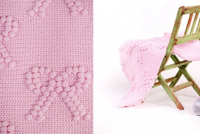Copertina in lana rosa per neonati..