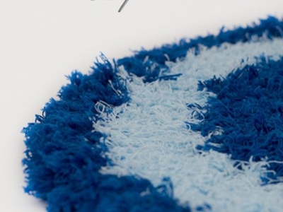 Ecco come realizzare un soffice e delicato tappetino per il bagno in cotone all'uncinetto